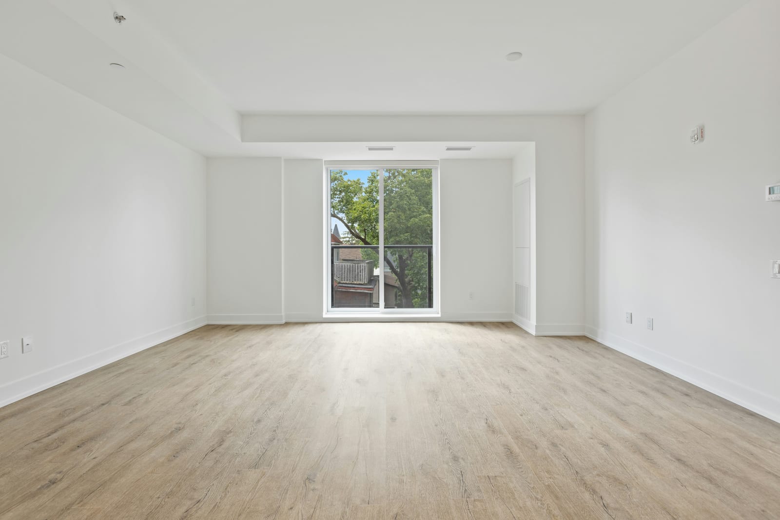 Empty bedroom before staging